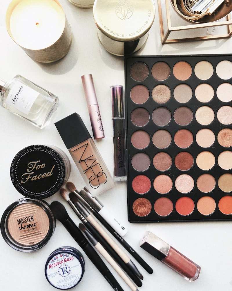 Flatlay of premium makeup products used at Lumière