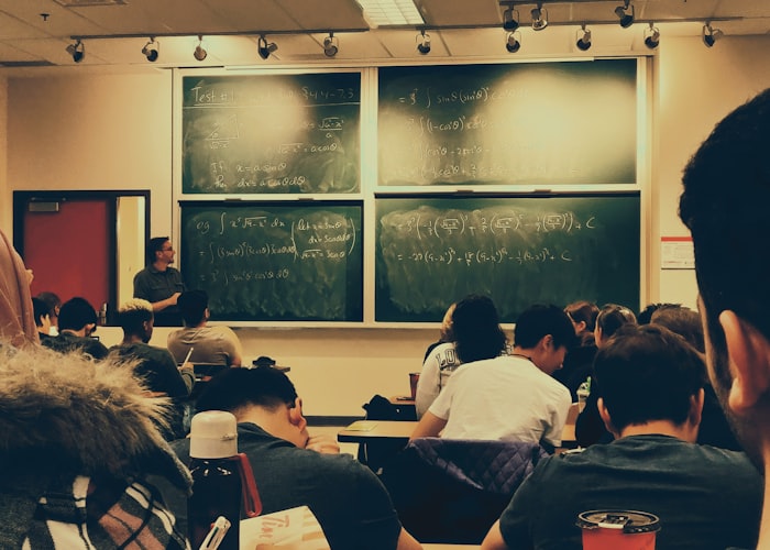 Students in a university lecture hall during an IELTS and PTE preparation class
